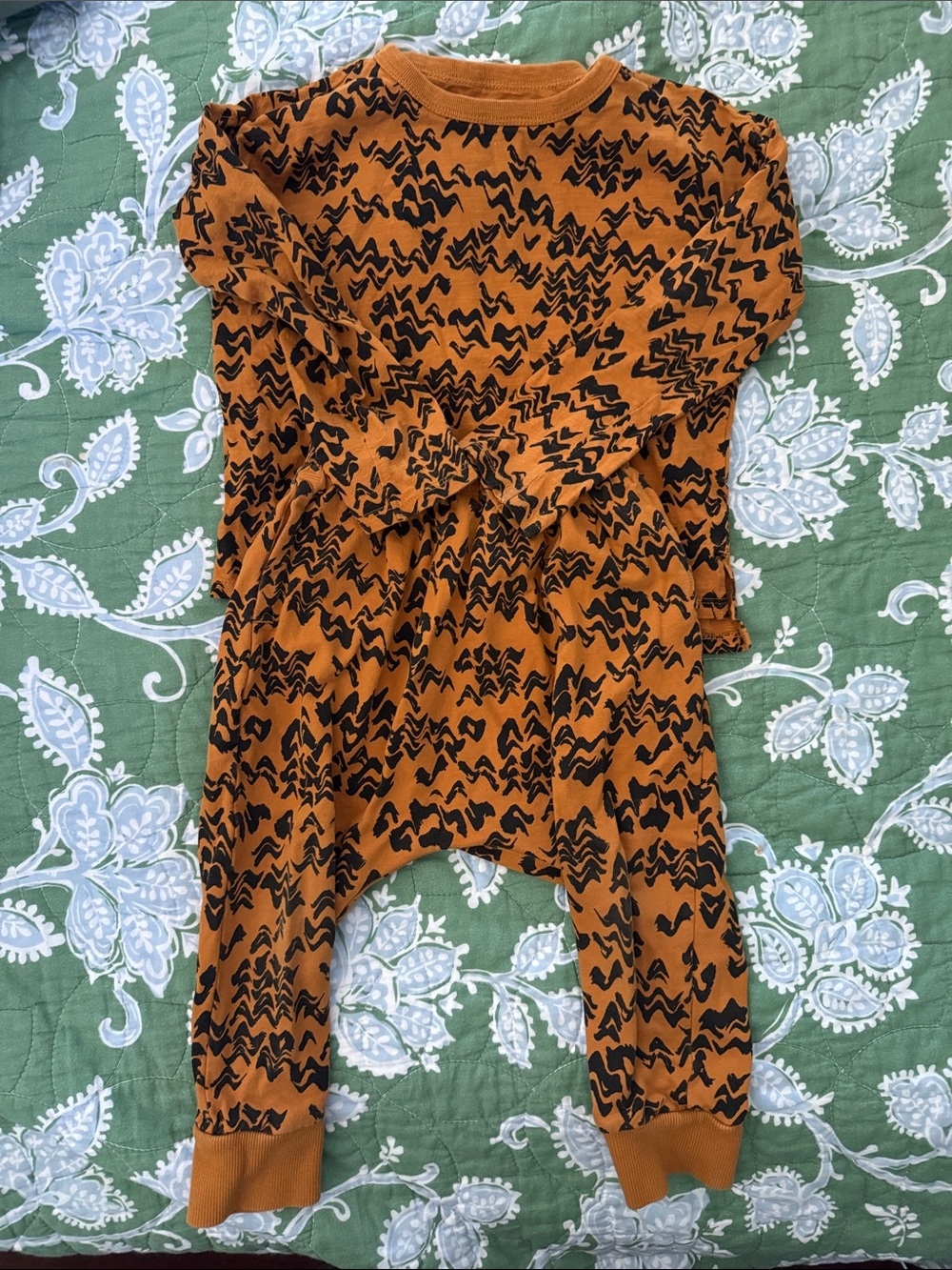 Kids Rust Orange Printed Romper with Black Pattern